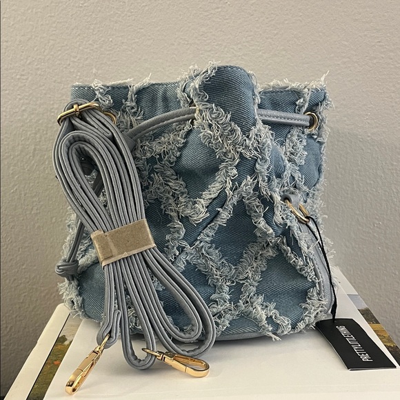 PrettyLittleThing Handbags - PrettyLittleThing Distressed Denim Mini Bucket Bag NWT